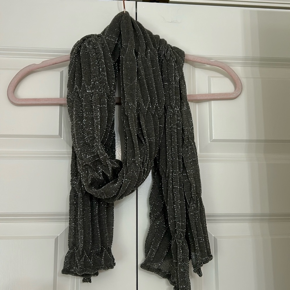 Sheer long scarf with grey glitter thread.